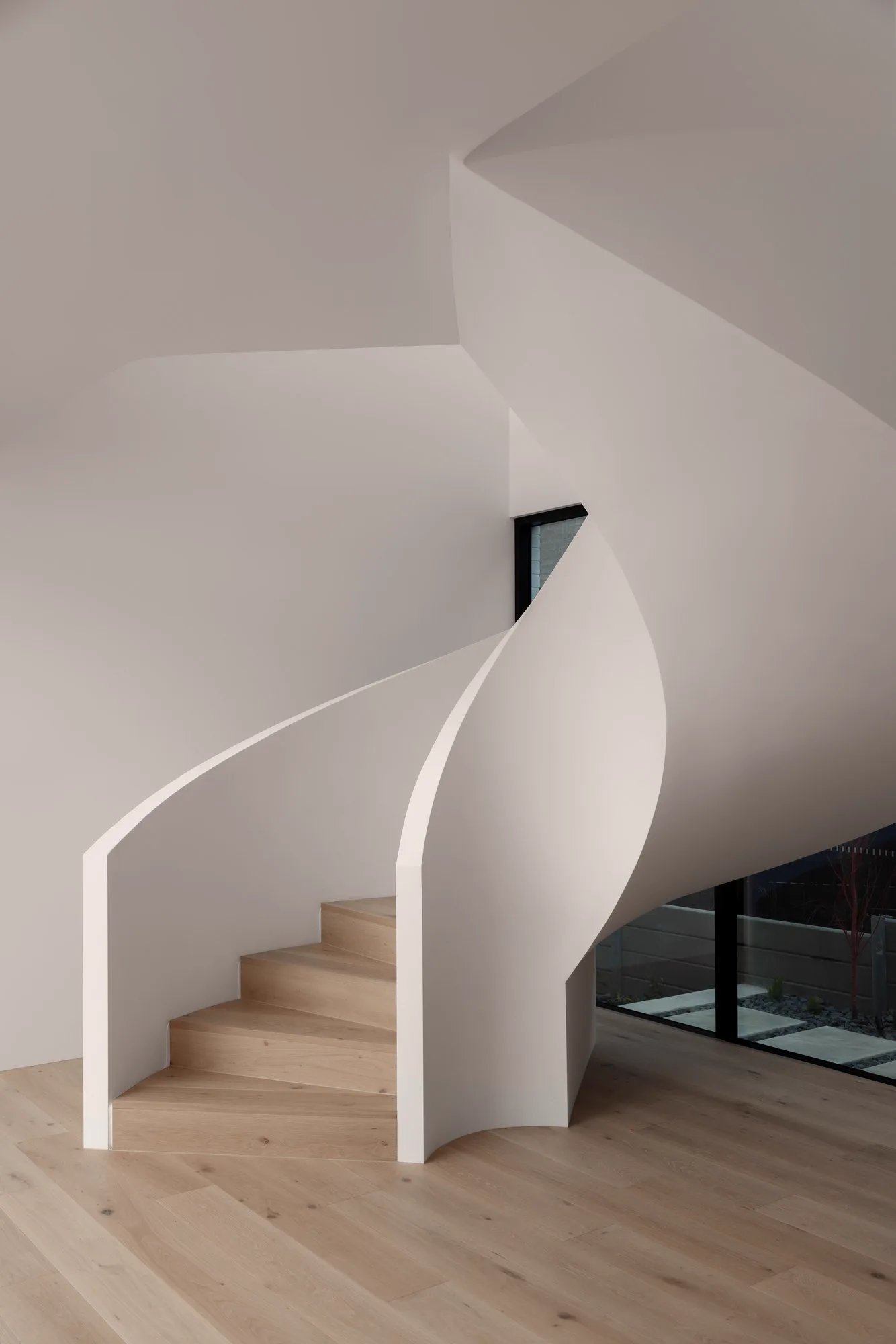 Curved staircase and finely resolved internal junctions at Clancys House